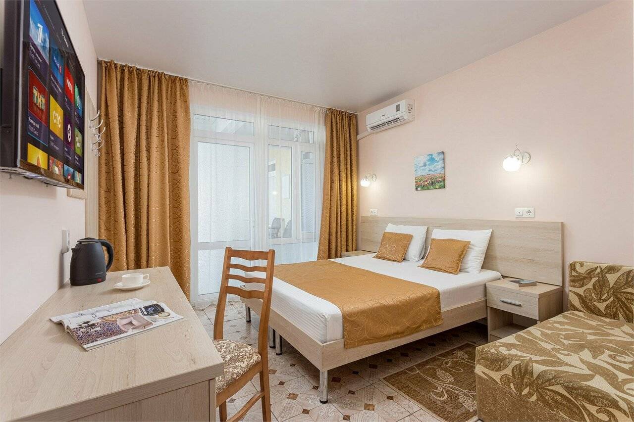 Фотографии номера Стандартный двухместный номер с 1 кроватью или 2 отдельными кроватями в Гостинице Русич Анапа